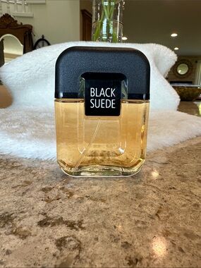 Vintage black suede by Avon